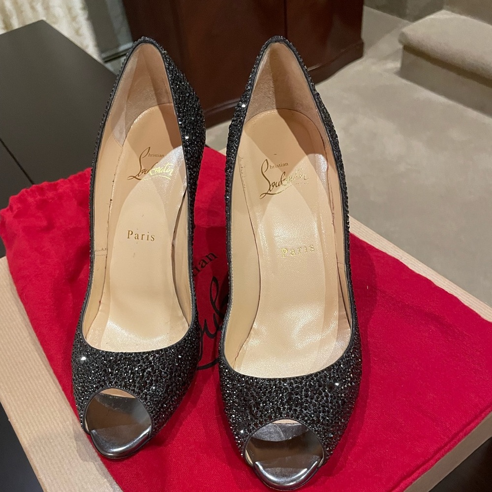 Christian Louboutin pumps worn once